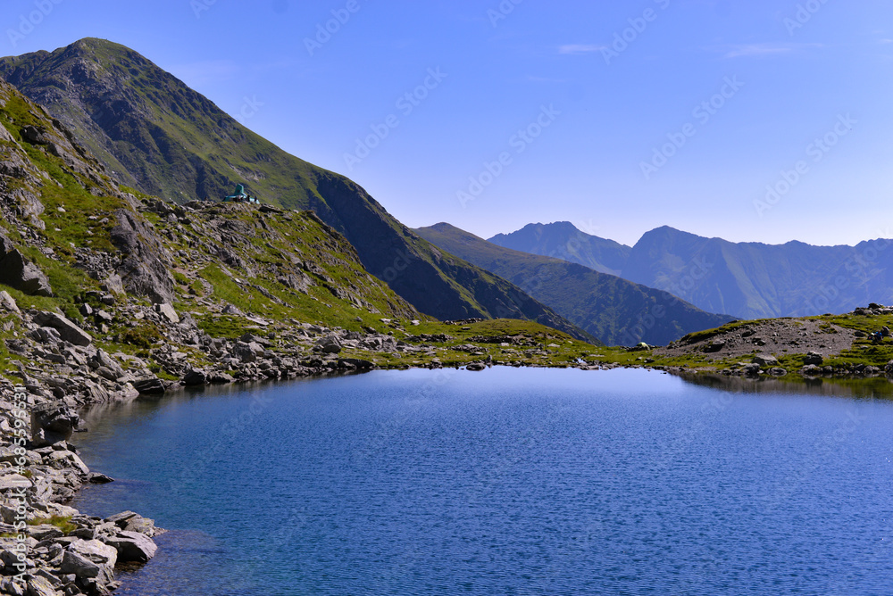 Glacial lake in the Carpathian mountains. Pure water in its natural form Glacial lake in the Carpathian mountains. Pure water in its natural form