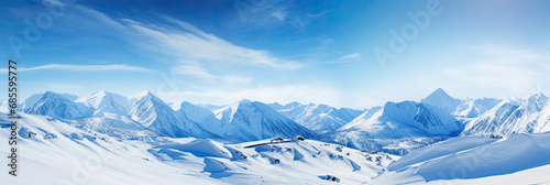 Panorama of Snow Mountain Range Landscape with Blue Sky © Sasint