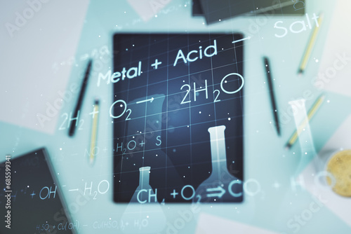 Double exposure of creative chemistry concept and digital tablet on background, top view, research and development concept
