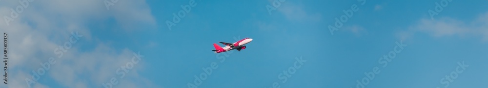 Airplane Of Airlines Flying In cloudy Sky panorama. copy space. Airplane Of Airlines Flying In cloudy Sky panorama. copy space.