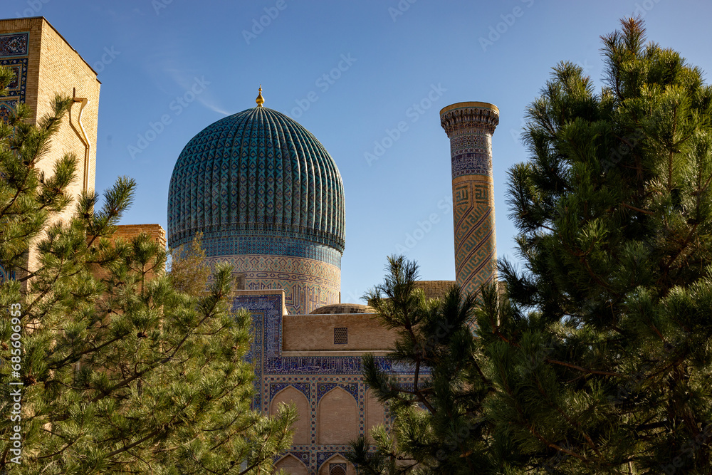 a beautiful old building with a dome on the top, Amir Temur Mausoleum, madrasah, Samarkand, autumn.