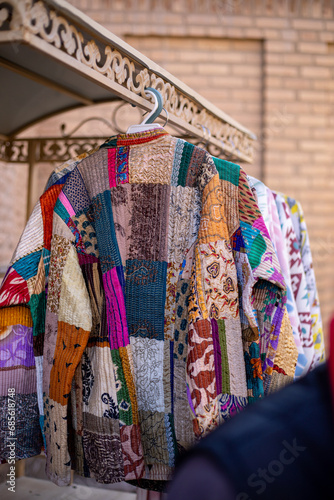 traditional dresses are selling in the streets of Citadel, Khiva, the Khoresm agricultural oasis, Citadel.