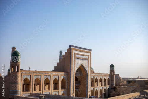 beautiful evening view of a historical building in the sunset reflection, Khiva, the Khoresm agricultural oasis, Citadel.