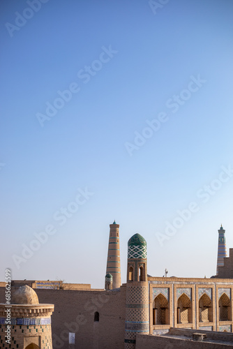 beautiful evening view of a historical building in the sunset reflection portrait photo, Khiva, the Khoresm agricultural oasis, Citadel.
