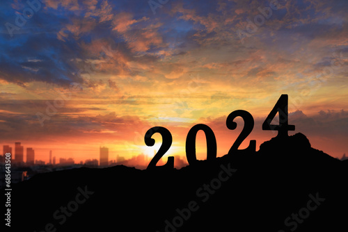 Concept happy new year,With number 2024 silhouette .On sky and sunrise backgrounds