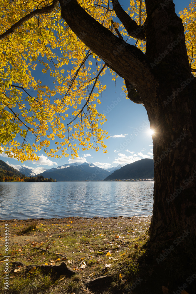 Autumn landscape with lake and mountains in Zell am See, Austria
