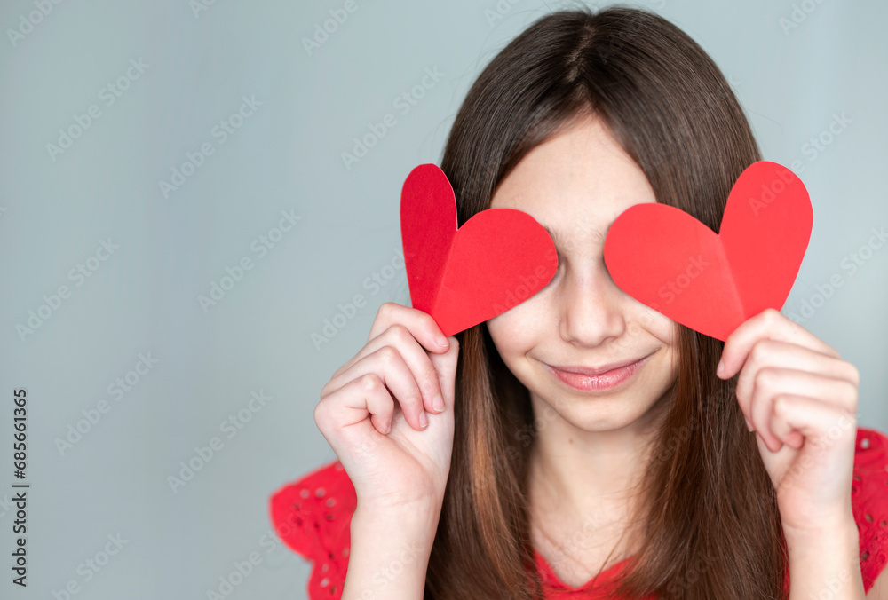 cute girl holding paper hearts, st.Valentines day concept cute girl holding paper hearts, st.Valentines day concept