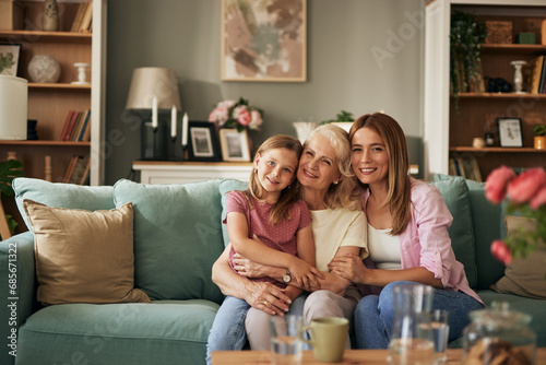Three female generation portrait at home photo