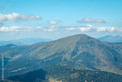 View on the mountain Petros from the other mountain - Hoverla. Beautiful panoramic summer landscape in the Carpathian Mountains, Ukraine