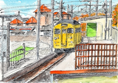 黄色い電車が走るローカル線