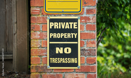 Warning sign, private property, no trespassing photo