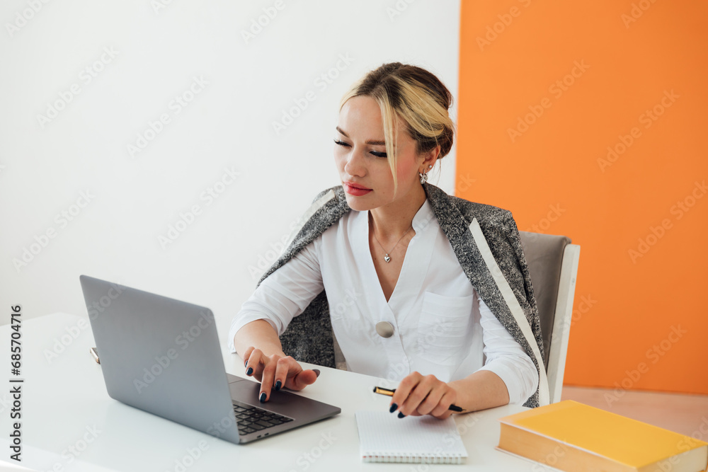 Business woman working on computer in office Business woman working on computer in office