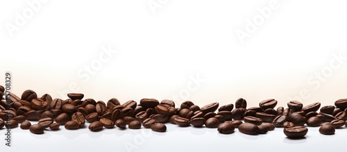 Coffee Beans create a zigzag shape on white Blurred effect Copy space image Place for adding text or design