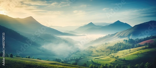 Beautiful sunrise in the mountains nature view from Kolukkumalai Munnar Kerala concept image Copy space image Place for adding text or design photo