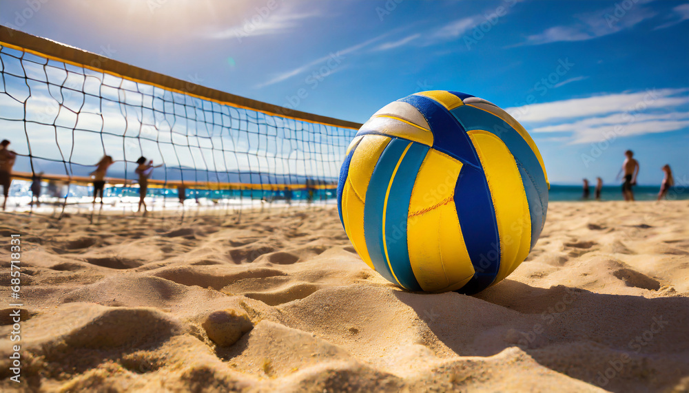 a volleyball ball is pictured on a beach with a volleyball net in the background this image can be used to represent beach sports and recreational activities