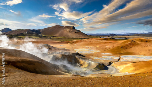 tipical icelandic nature landscape hverarondor hverir geothermal area in iceland near lake myvatn the area with multicolored mud cracked and steam popular travel and hiking destination photo