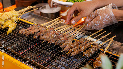 Jando Bandung meat satay is being grilled, sate jando bandung photo
