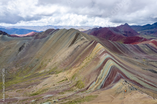 Vinicunca in Cusco, Peru with an elevation of over 17,000 ft.  The landscape is known as Rainbow Mountain or Montana de Siete Colores.
