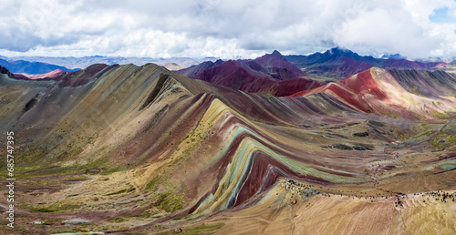 Drone panorama view of Vinicunca in Cusco, Peru with an elevation of over 17,000 ft.  The landscape is known as Rainbow Mountain or Montana de Siete Colores. photo