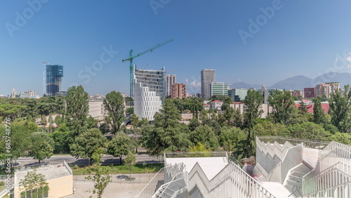 Panorama showing cityscape over Tirana with its colorful apartment buildings and skyscrapers timelapse, Tirana, Albania. photo