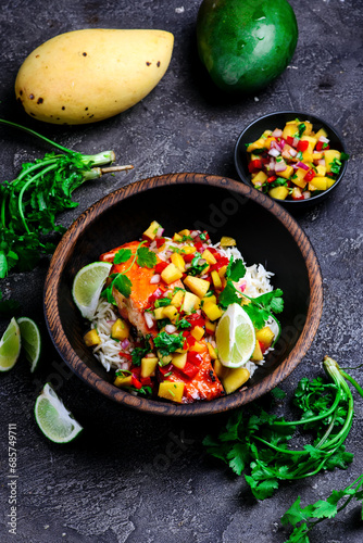 Grilled salmon with mango salsa and rice.top veiw