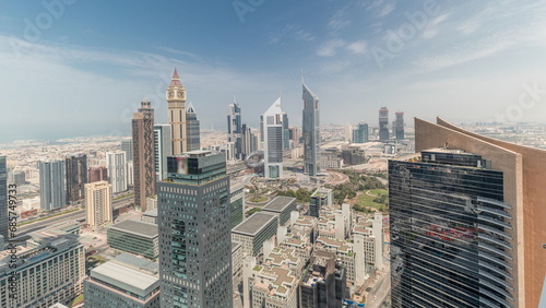 Panorama showing futuristic skyscrapers in financial district business center in Dubai on Sheikh Zayed road timelapse