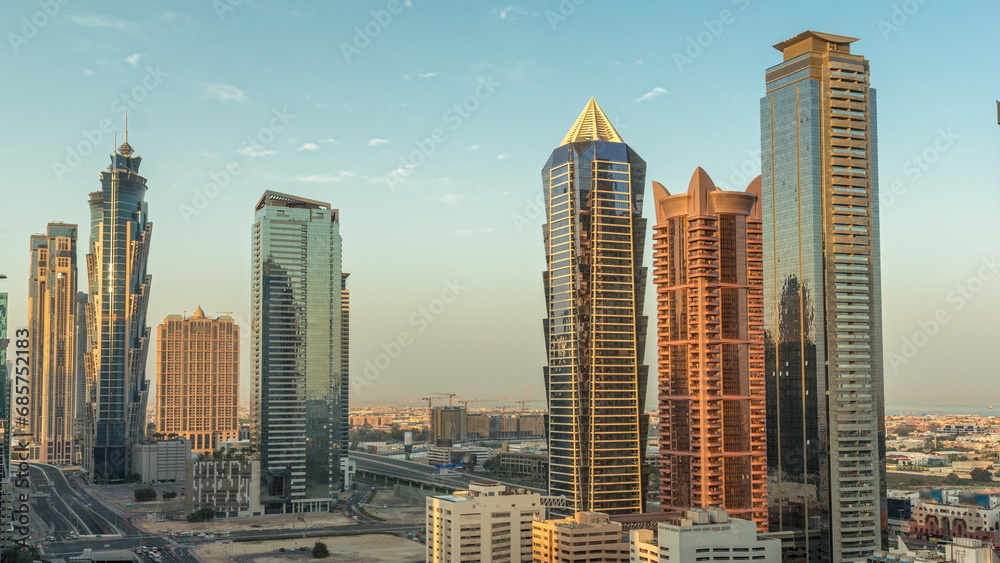 Obraz premium Business bay district skyline with modern architecture morning timelapse from above.