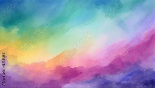 colorful watercolor background with painted sunset sky colors of pink blue purple green and yellow abstract beautiful painting on border with no people for template or website background