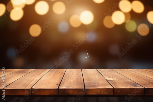 Table close-up with blurred Christmas Festive Background with snowflakes bokeh and lights