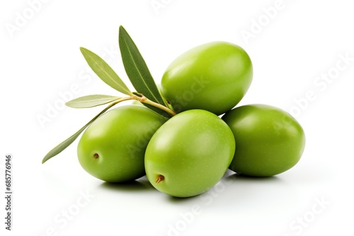 a group of green olives with leaves