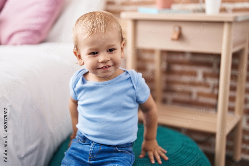 Adorable toddler smiling confident standing at bedroom Adorable toddler smiling confident standing at bedroom