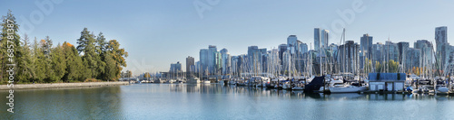 Panorama of the skyline of Vancouver as seen from Stanley Park during a fall season in British Columbia, Canada