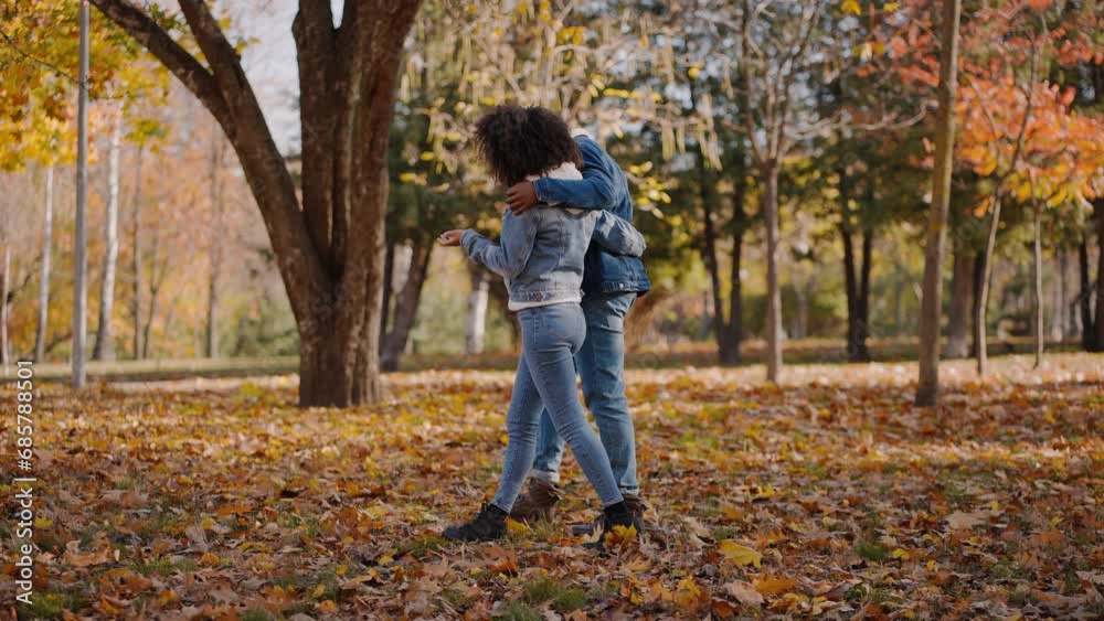 Wife with husband goes mushroom picking in autumn forest Wife with husband goes mushroom picking in autumn forest