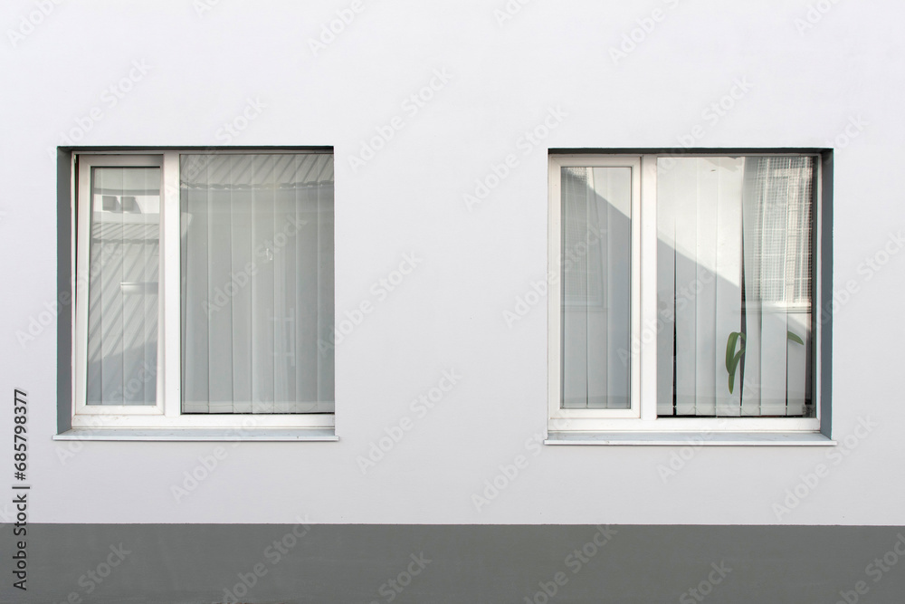 Wall of a building with a window