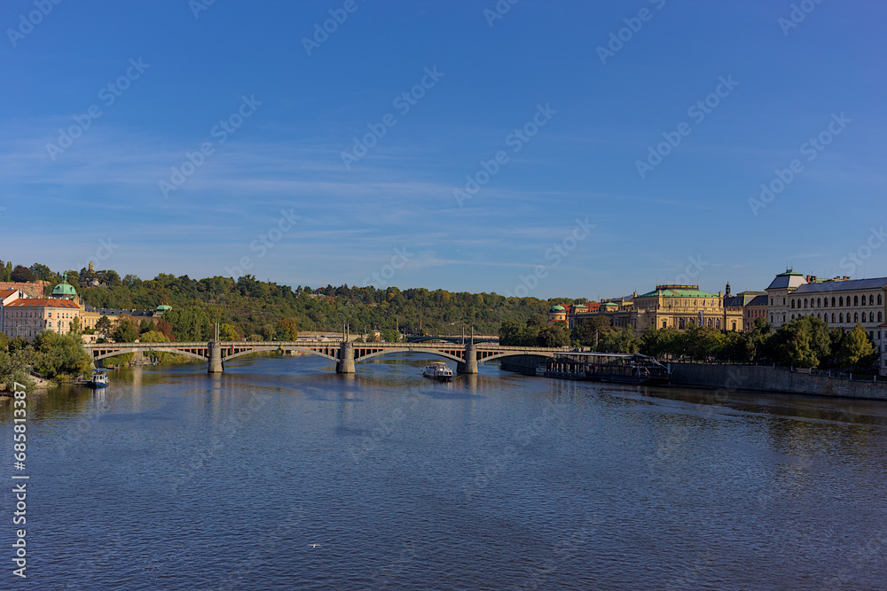 Manes Bridge, Manesuv Most, across Vltava River, Prague, Czech Republic. Picturesque city landscape. Popular tourist attraction.
