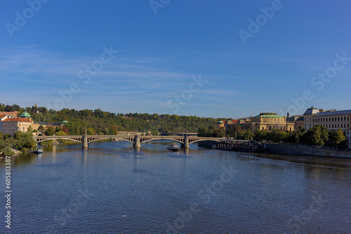 Manes Bridge, Manesuv Most, across Vltava River, Prague, Czech Republic. Picturesque city landscape. Popular tourist attraction. © serhii