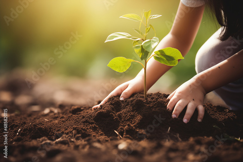 Close-ups of children gardening or planting trees, fostering a sense of care and responsibility for nature, with copy space photo