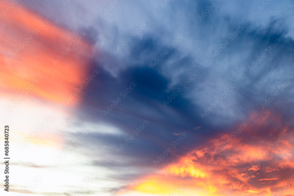 Colorful dramatic sunset sky and beautiful cloud in the evening.