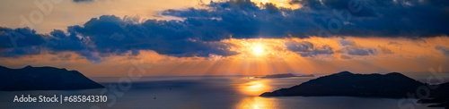 Sunset view in the mediterranean sea between Greece and Turkey. Left side is Megisti island and right side is Kaş Antalya.  photo