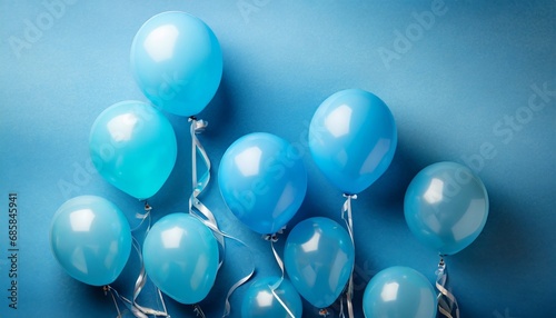 blue balloons on blue background with copy space