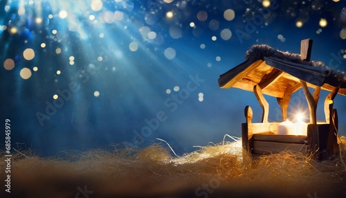 nativity scene christian christmas concept birth of jesus christ wooden manger in dark blue night banner copy space jesus is reason for season salvation messiah emmanuel god with us hope