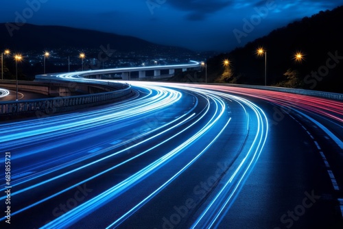 Blue curve car lights at night with long exposure