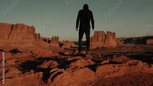 Man In Western Red Rock Monument Valley Epic Landscape photo
