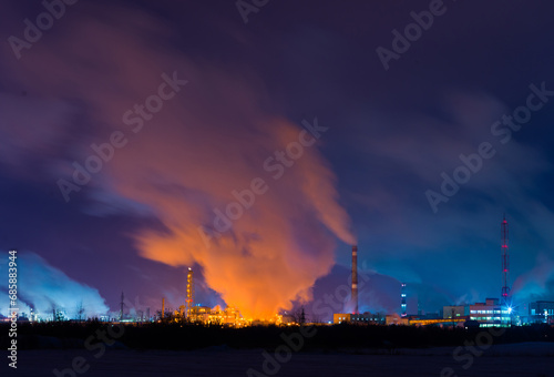 Abstract industrial landscape with smoke and lights