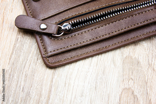 Clasp, snake. Leather wallet clasp, snake on the wallet.