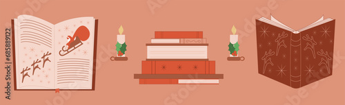 Set of books, open books with Christmas ornament, candle with holly leaves, closeup