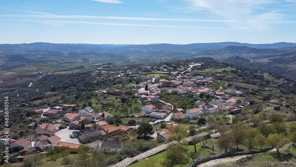 Aerial exterior view at the iconic Numão Castle, ruins Castle on top at the mountains, an heritage medieval architecture structure, Numão village downtown, Portugal