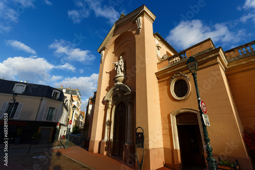 The church of Sainte-Genevieve, rebuilt at the beginning of the 18th century to replace a first church of the 12th century. Asnieres sur Seine. France. photo