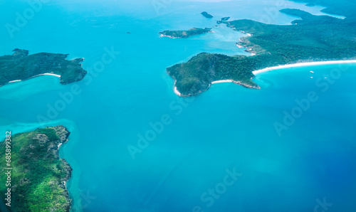 Fototapeta Naklejka Na Ścianę i Meble -  Aerial view of the Whitsunday Islands, in the Great Barrier Reef, the world's largest coral reef  system located in the Coral Sea, coast of Queensland, Australia. Dec 2019