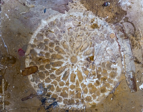 An ancient wooden board with beautiful patterns. Weathered wood panel with curved islmaic pattern. Aged and stained ornamented wood plate. photo